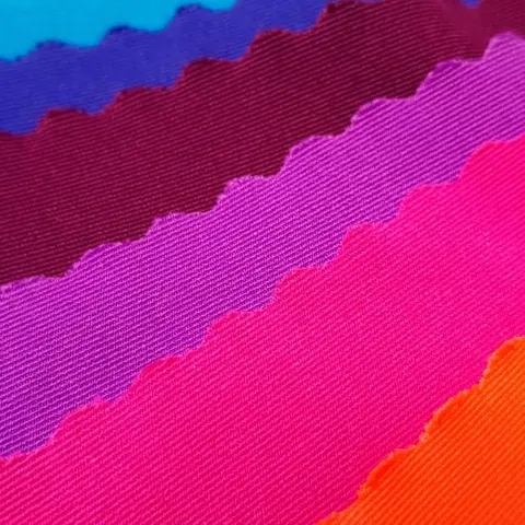 Muestras del textil Bahía en morado, fucsia y naranja
